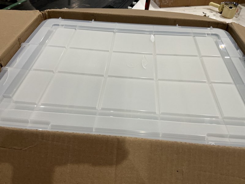 Condition photo showing As Is for iris usa 3-pack 60 qt storage bins with gasket lids, clear/blue | weatherpro seal helps protect bulky items for moving, garage, attic and basement storage 60 qt. - 3 pack