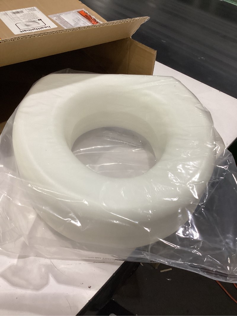 Condition photo showing New/Like New for healthsmart enhanced comfort 5" raised (round) toilet seat risers for seniors 5 slip resistant pads fsa/hsa eligible padded toilet seat elevation 15.7 x 15.2 x 6.1