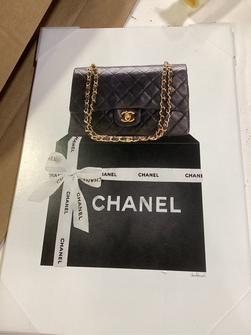 Condition photo showing Good Condition for black quilted purse on bold glam bow box 19"l x 13"w