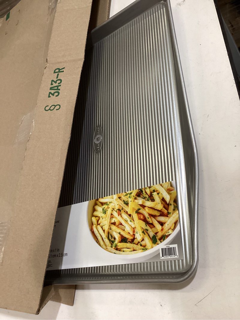 Condition photo showing As Is for usa pan bakeware nonstick extra large baking sheet pan, aluminized steel set of 1 xl sheet pan