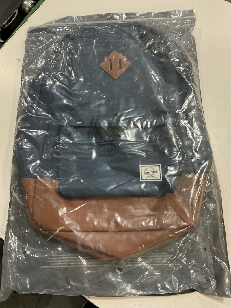 Condition photo showing New/Like New for heritage canvas backpack - navy