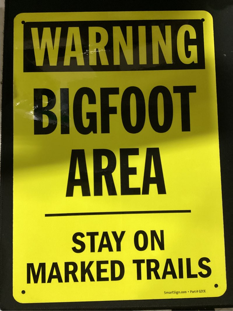 Condition photo showing Good Condition for smartsign 14 x 10 inch “warning - bigfoot area, stay on marked trails” sasquatch metal sign, 40 mil laminated rustproof aluminum, black and yellow, made in usa 10" x 14" aluminum sign