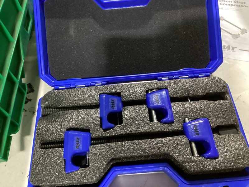 Condition photo showing New/Like New for orion motor tech macpherson strut spring compressor tool set with 10.5" range, dual heavy-duty coil spring compressor tools with 1/2" square drive, 13/16" hex auto tool set for suspension work, blue