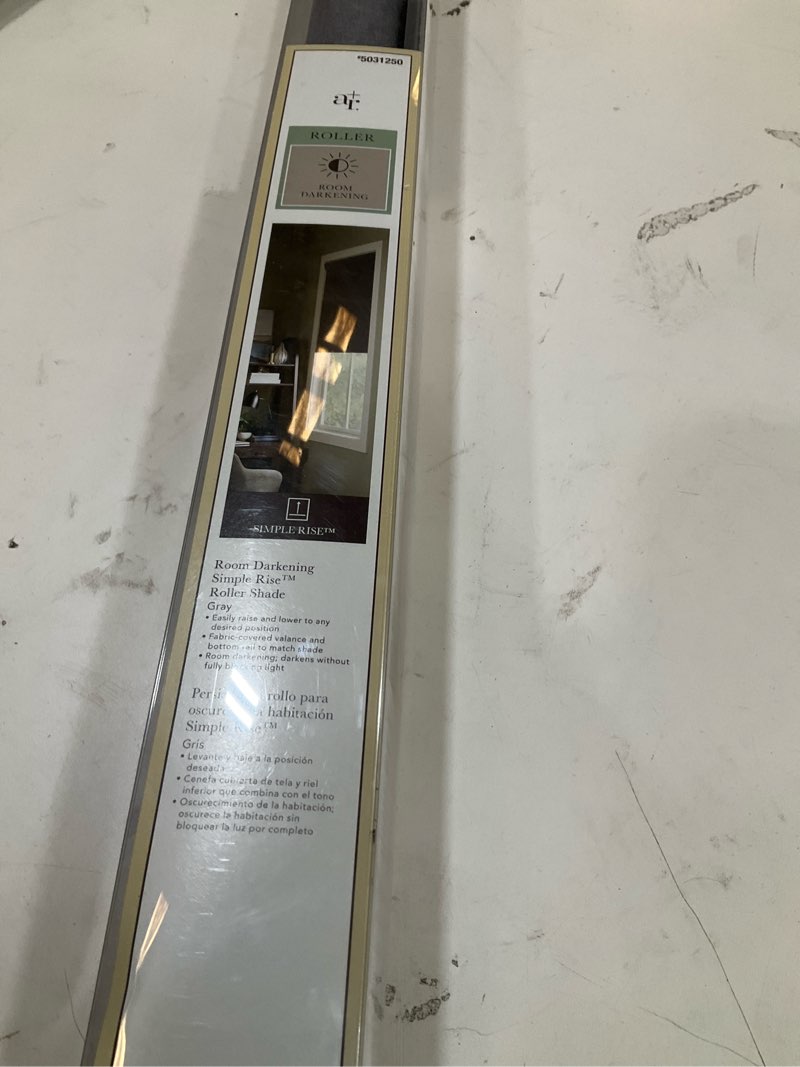 Condition photo showing As Is for allen + roth simple rise roller 35-in x 72-in gray room darkening cordless roller shade