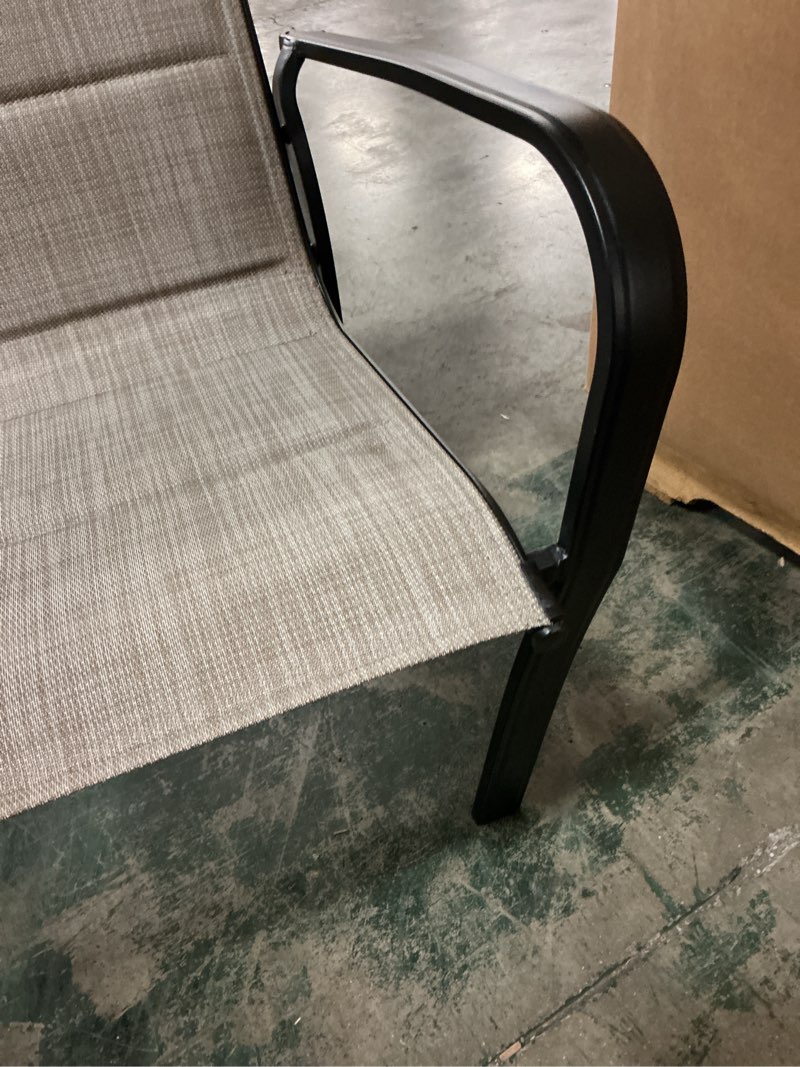 Condition photo showing As Is for style selections pelham woven stackable black metal frame stationary dining chair with tan sling seat