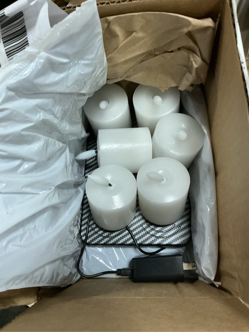 Condition photo showing As Is for genswin rechargeable votive candles battery operated with charging base, 6 pack led flameless battery votive candles with remote timer(white, real wax, 2 x 3.2 inch) classic-white-6