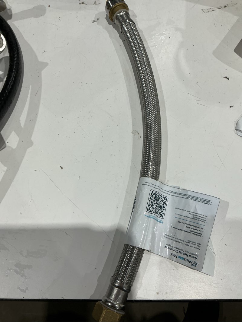 Condition photo showing As Is for sharkbite max 18-in 3/4-in push-to-connect inlet x 3/4-in fip outlet braided stainless steel water heater connector