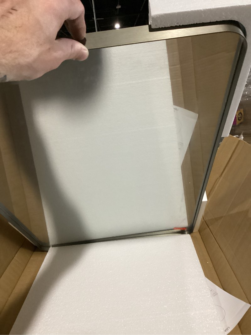 Condition photo showing New/Like New for loaao 20x30 inch brushed nickel bathroom mirror, rounded rectangle silver metal frame mirror, brushed nickel, anti-rust, shatter proof, hangs horizontally or vertically brushed nickel 20"l x 30"w