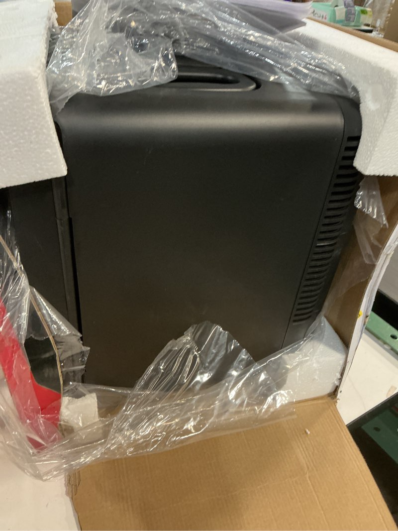 Condition photo showing As Is for Frigidaire Mini Personal Fridge Cooler, Countertop, Holds Up to 10L/15 Cans, Brushed Black Stainless Rugged Design, Portable for Skincare, Makeup, Car, Office, Bedroom, Dorm Room, or Cabin