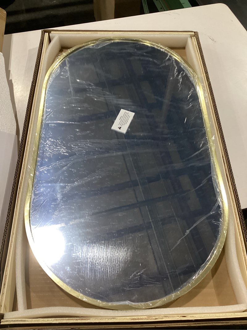Condition photo showing New/Like New for gold oval mirror, 17"x30" oval bathroom mirror, vanity mirror with brushed metal frame, wall mount mirrors decor for bathroom, bedroom, entryway, living room(hangs horizontally or vertically) gold 17"l x 30"w