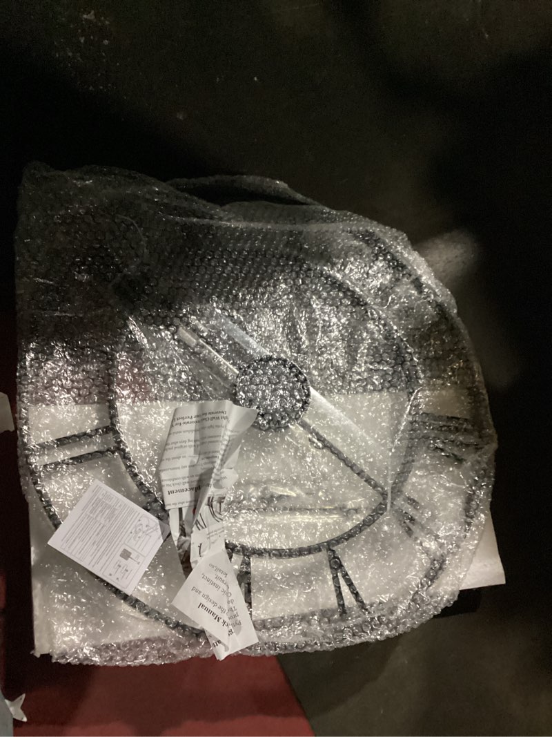 Condition photo showing Good Condition for 24 Inch Large Oversized Farmhouse Modern Decorative Wall Clock for Living Room,Silent Industrial Big Roman Numerals Vintage Metal Round Wall Clocks for Kitchen,Dinng Room,Office Black Roman 24 inch