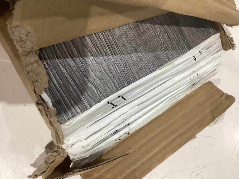 Condition photo showing As Is for atopose peel and stick floor tile waterproof,dark grey,wood effect vinyl planks, 36-pack 54 sq ft— easy diy install and transfer quickly for kitchen, bathroom,bedroom,other indoor spaces 54 sq.ft dark gray