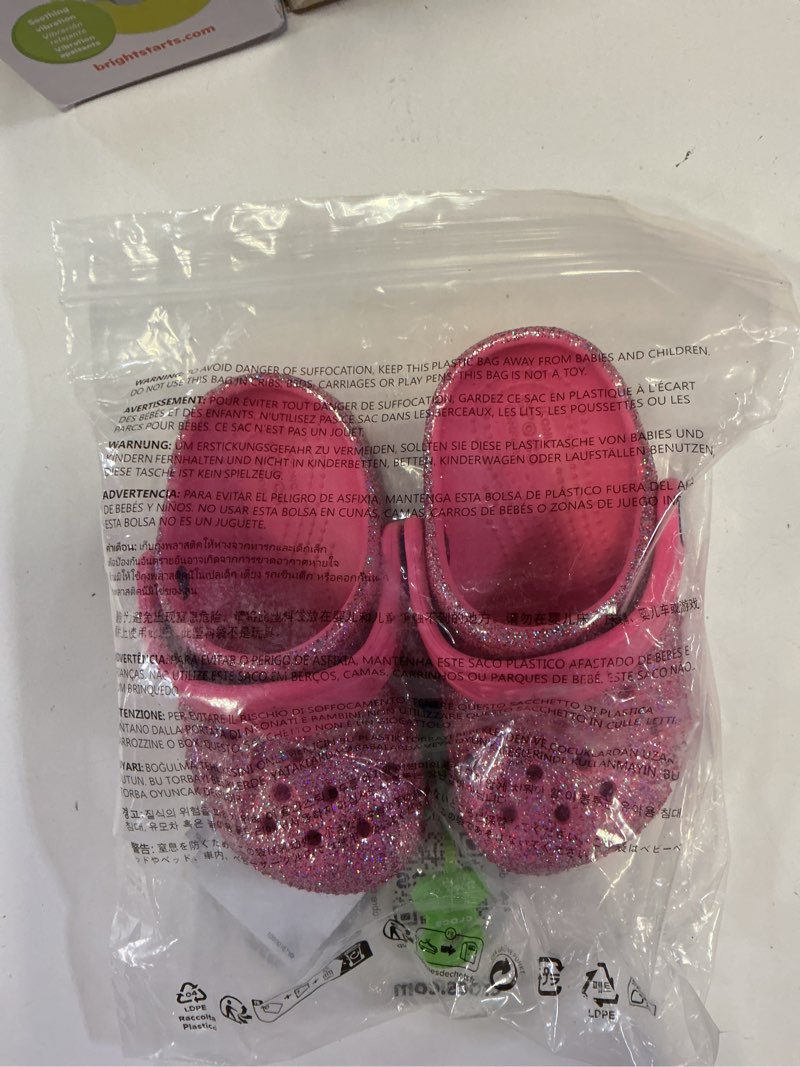 Condition photo showing New/Like New for crocs baya toddler glitter clogs, toddler girl's, size 7