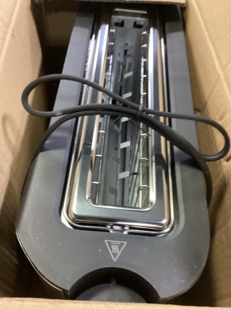 Condition photo showing New/Like New for elite gourmet ect3200 2-slice, 1 long slot, slim toaster, reheat, 6 toast settings, defrost, cancel functions, built-in warming rack, extra wide slots for bagels waffles, stainless steel & black 2 slice stainless steel