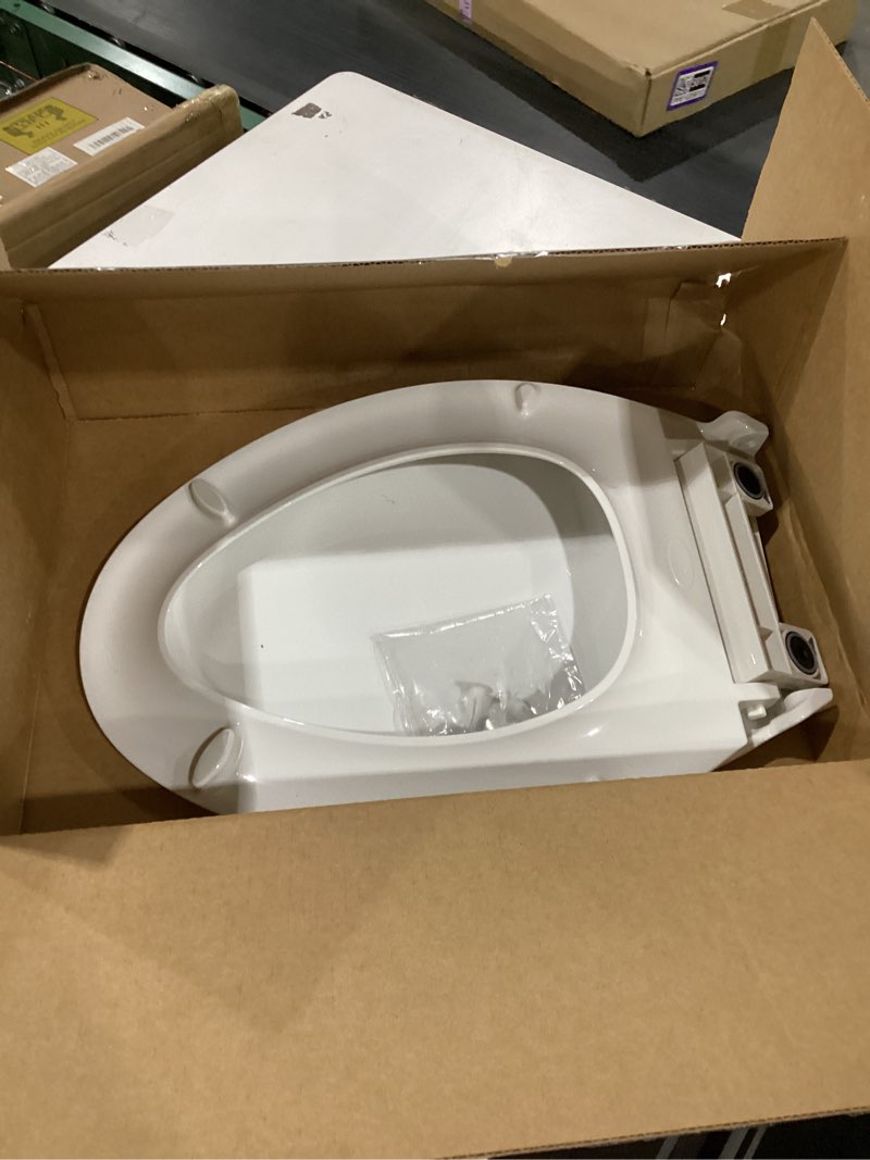 Condition photo showing As Is for KOHLER 4636-RL-0 Cachet ReadyLatch Elongated Toilet Seat Slow Close, Soft Close Toilet Seat Quiet Lid, Contoured Grip-Tight Bumpers Installation Hardware, Apartment Essentials, White White Elongated Ready Latch