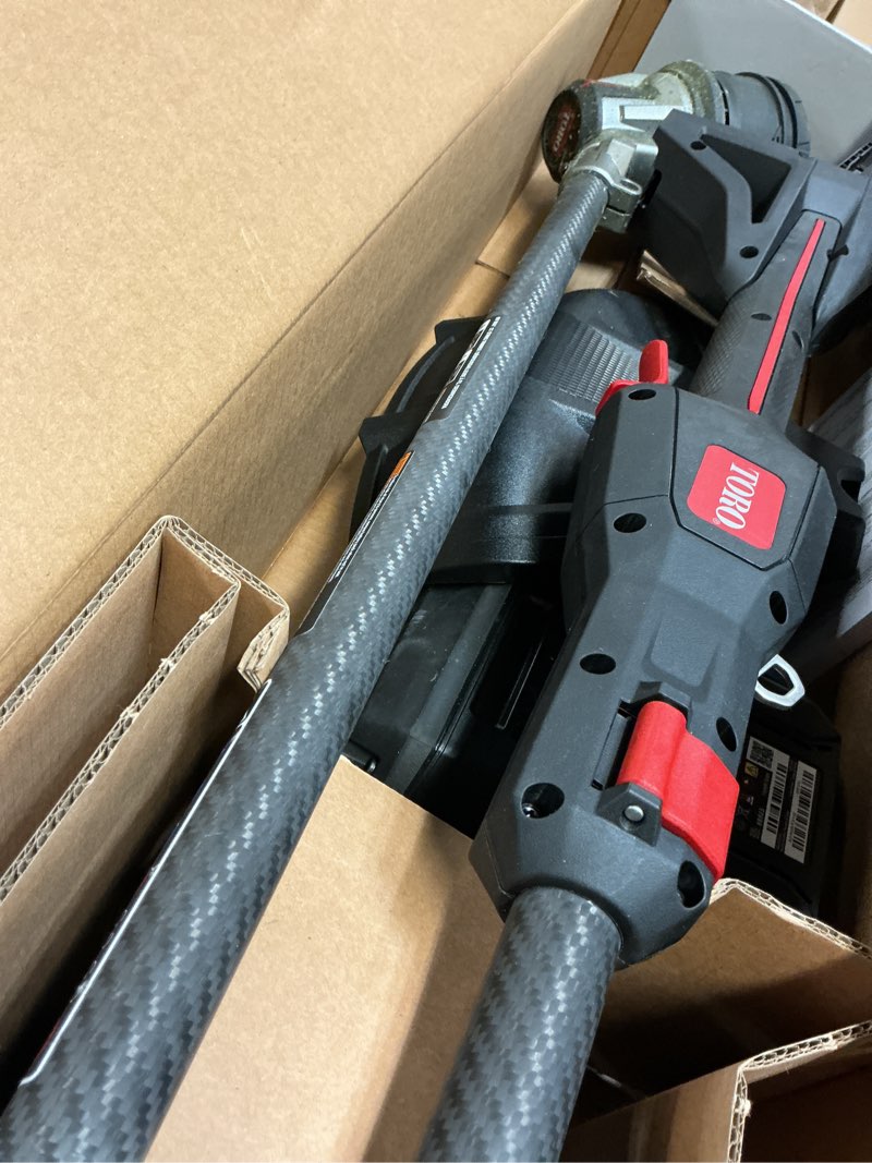 Condition photo showing As Is for toro 51838 17 in. 60 v battery string trimmer kit (battery & charger)