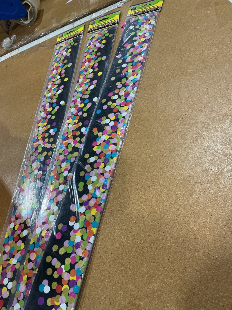 Condition photo showing New/Like New for colorful confetti on black straight border trim , pack of 3