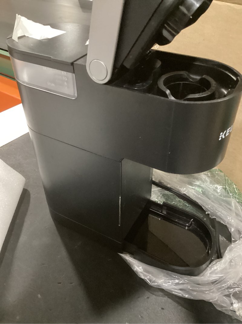 Condition photo showing As Is for (incomplete) keurig k-mini single serve k-cup pod coffee maker, 6 to 12oz brew size, with cord storage, perfect for small spaces, black