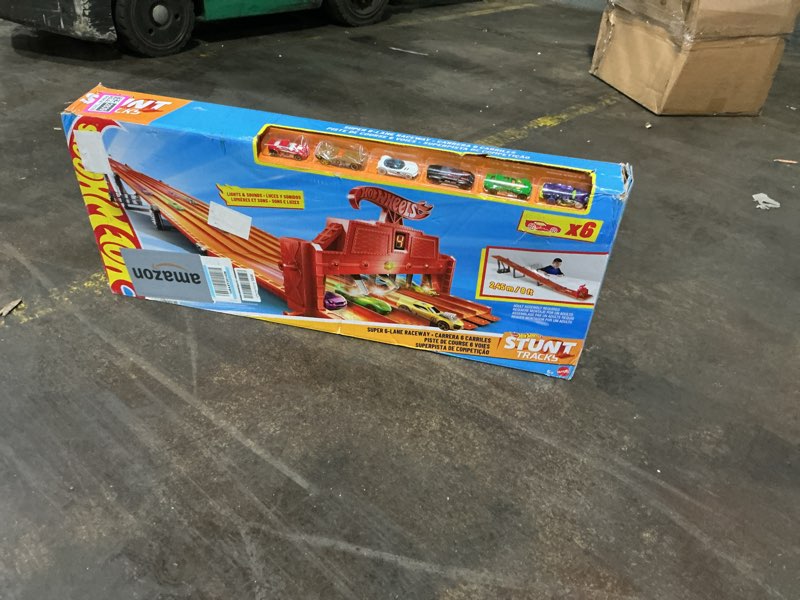 Condition photo showing Good Condition for hot wheels toy car playset with lights, sounds & 6 1:64 scale vehicles, super 6-lane raceway, 8-foot track that rolls up for storage (amazon exclusive)