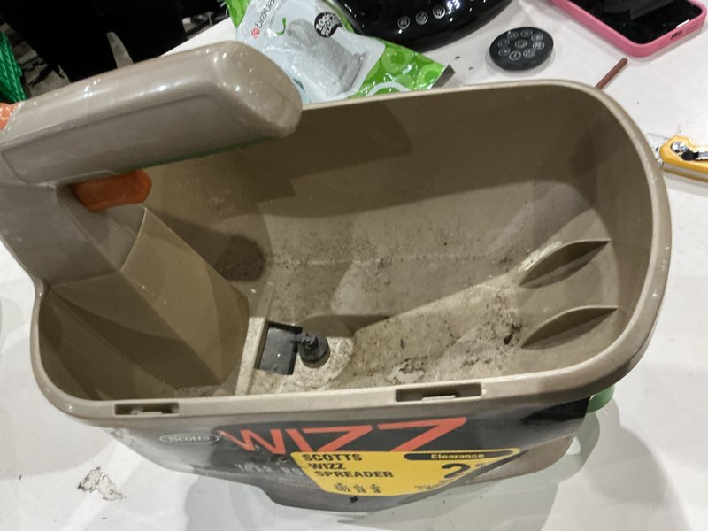 Condition photo showing As Is for scotts wizz 60 in. w handheld spreader for fertilizer/ice melt/seed 4 lb