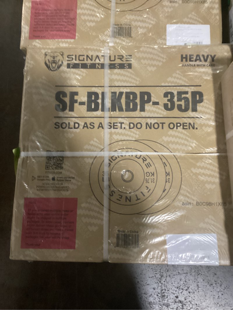 Condition photo showing Good Condition for Signature Fitness 2-Inch Cast Iron Barbell Set, Including Multiple LBS Weight Plates and 6FT Barbell Set, Multiple 35 lbs