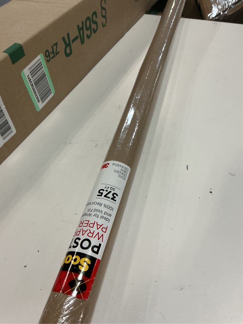Condition photo showing New/Like New for paper postal wrapping 2.5x15ft