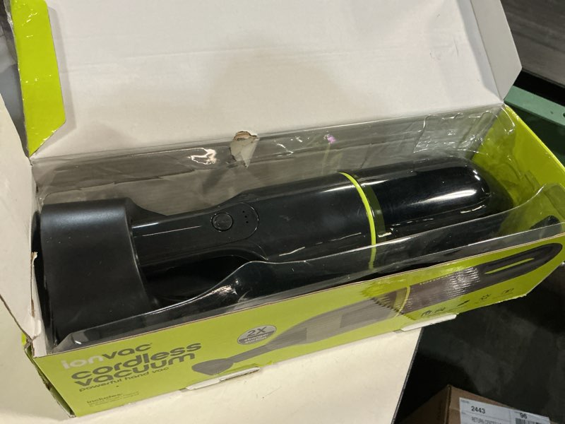 Condition photo showing As Is for tzumi ionvac handvac, cordless handheld vacuum with usb-charging and multiple attachments - green