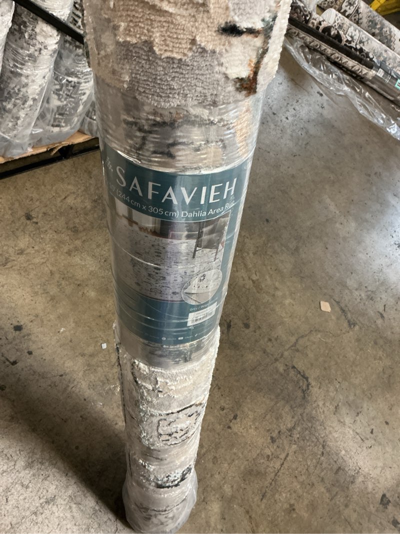 Condition photo showing New/Like New for safavieh dahlia area rug 8' x 10'