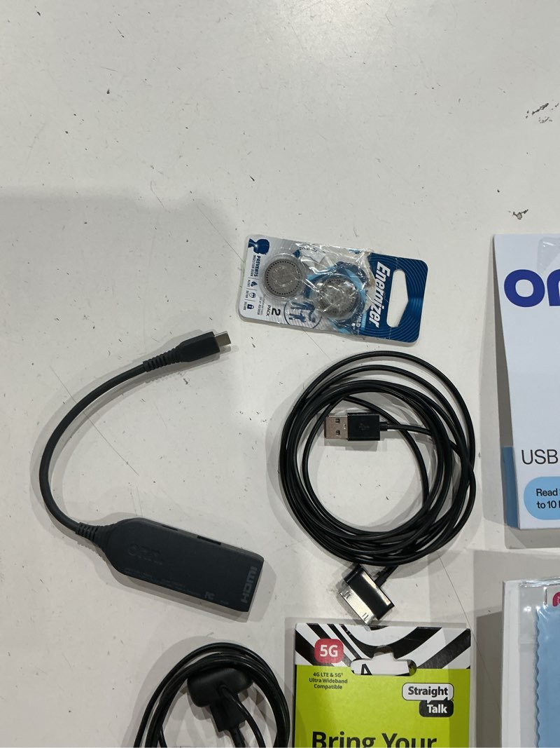 Condition photo showing As Is for assorted lot of electronics (headphones, small gadgets, headsets, etc.) 