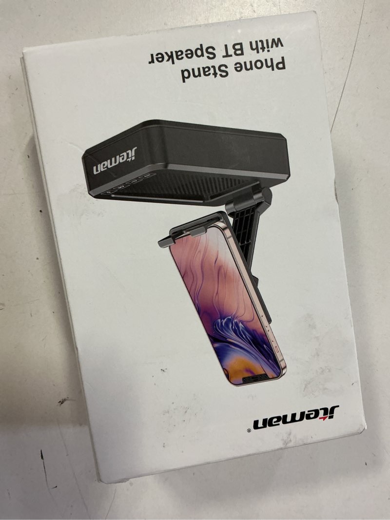 Condition photo showing New/Like New for Cell Phone Stand with Wireless Bluetooth Speaker and Anti-Slip Base HD Surround Sound Perfect for Home and Outdoors with Bluetooth Speaker for Desk Compatible with iPhone/ipad/Samsung Galaxy Black
