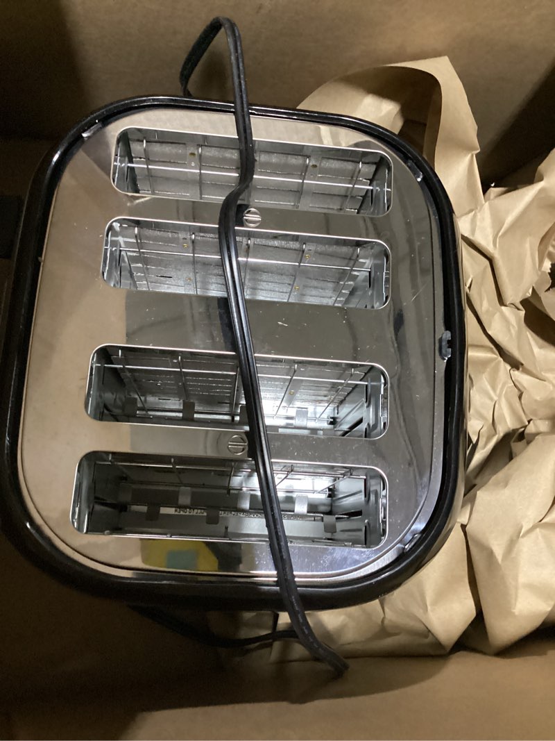 Condition photo showing Good Condition for BLACK+DECKER 4-Slice Toaster, Extra Wide Slots, 7 Shade Settings, 1400 Watts, Frozen and Bagel Buttons, Toast Shade Selector, Extra Lift 4-Slice Black