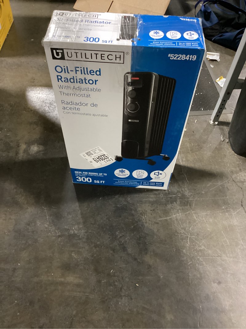 Condition photo showing As Is for Utilitech 1500 -Watt Oil-filled radiant Utility Indoor Electric Space Heater with Thermostat