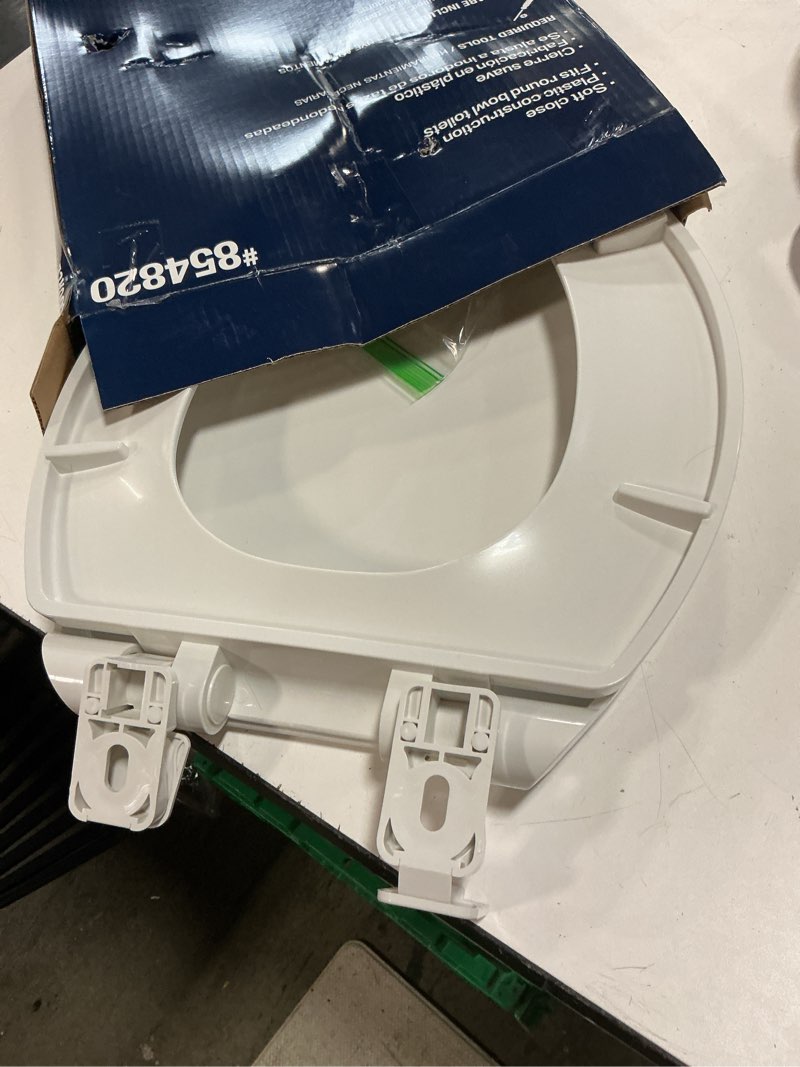 Condition photo showing As Is for project source plastic white round soft close toilet seat