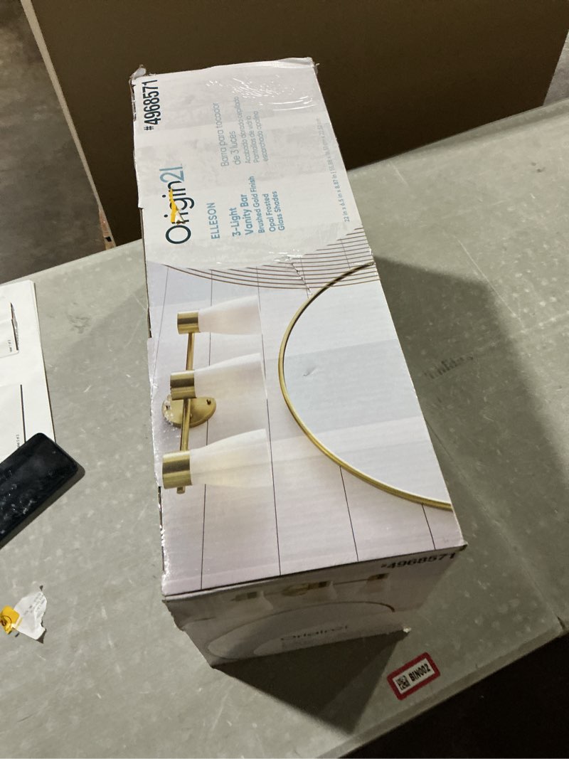 Condition photo showing As Is for origin 21 elleson 22-in 3 light brushed gold modern/contemporary bathroom vanity light