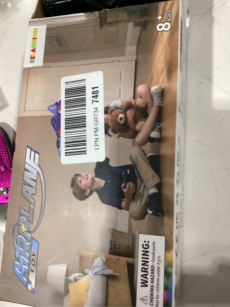 Condition photo showing As Is for not tested xelabration airplane toy ages 8+