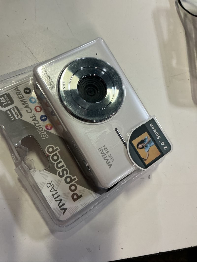 Condition photo showing As Is for vivitar popnap digital camera, white, 16x zoom, 1080p, micro sd, single pack