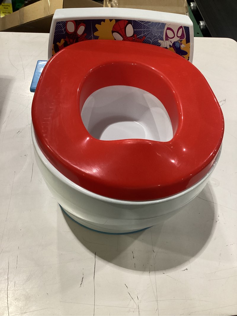 Condition photo showing Good Condition for the first years spidey and his amazing friends potty training toilet - 2-in-1 potty & removable toddler toilet seat attachment with flush sounds - includes anti-splash seat and non-slip grip