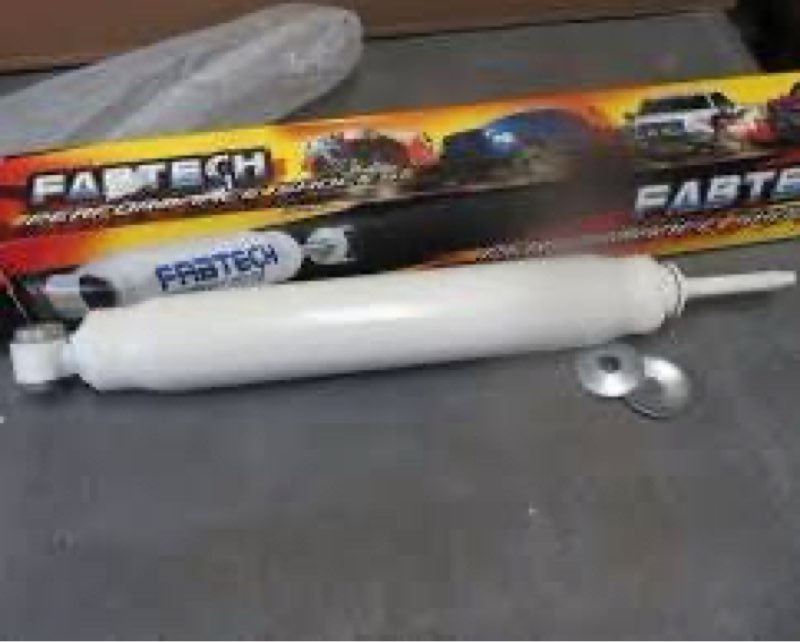 Condition photo showing New/Like New for fabtech performance shocks large 9/16”chrome hardened rod,massive 1 3/8” diameter piston,9 stage valving,polyurethane bushings