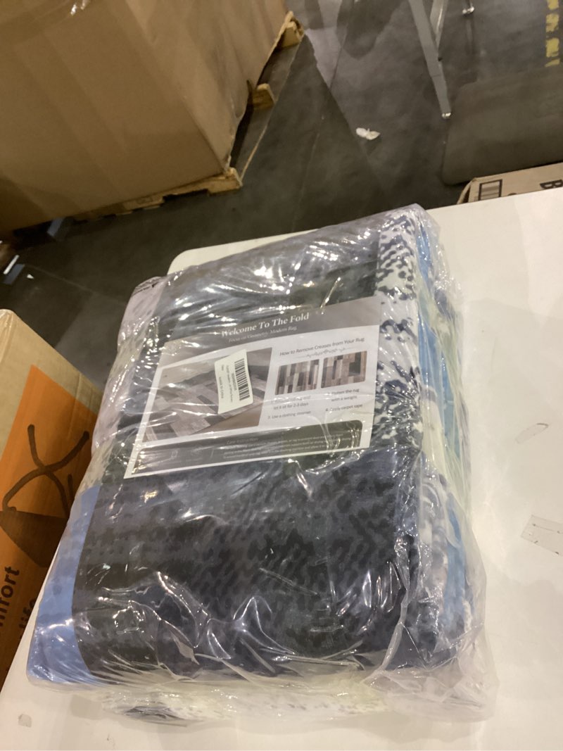 Condition photo showing New/Like New for FlyDOIT Modern Geometric Patchwork Area Rug, 6x9 Blue Large Rugs for Living Room, Rockwood Collection Indoor Rugs for Bedroom, Throw Carpet Floor Decor for Entryway Dining Room Office Nursery 6' x 9' (Rectangular) Blue