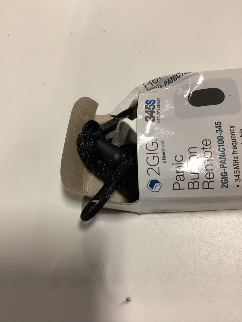 Condition photo showing As Is for 2gig panic button remote