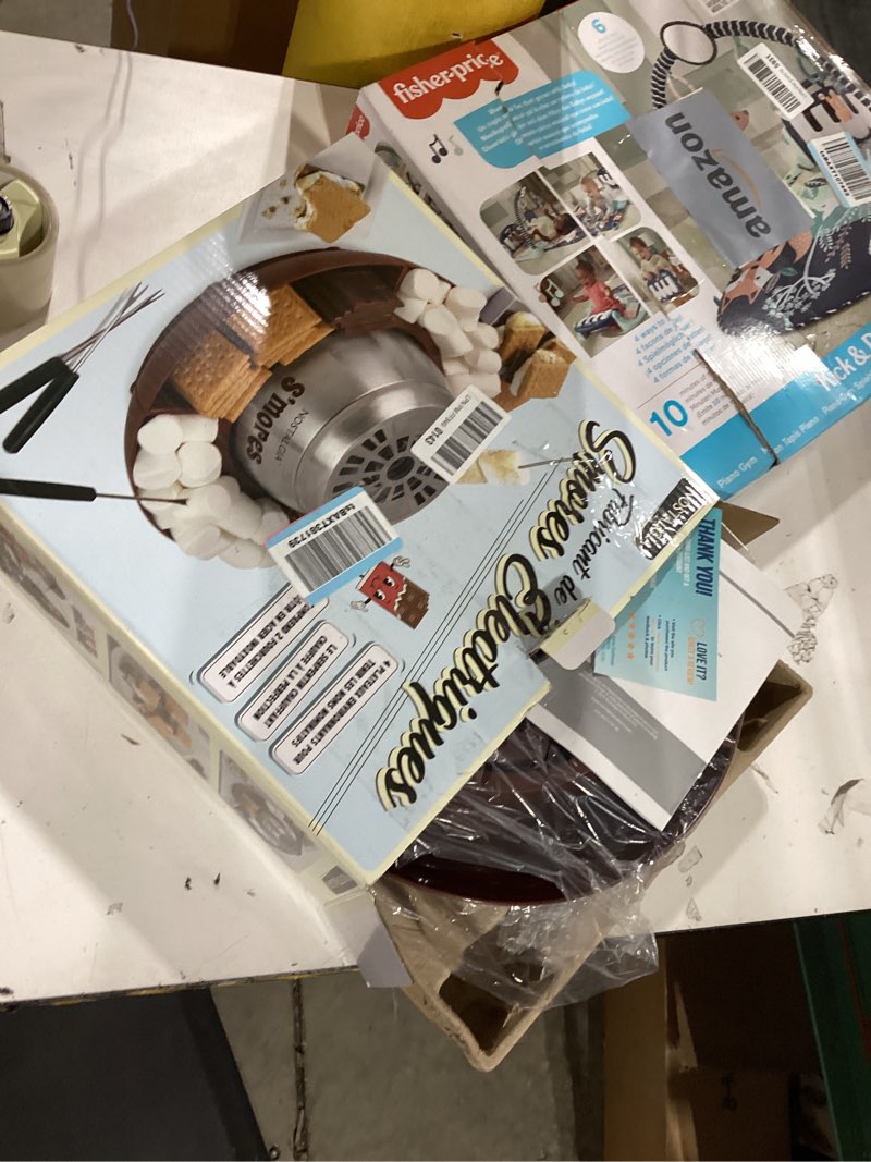 Condition photo showing As Is for Nostalgia Indoor Electric Stainless Steel S'Mores Maker with 4 Lazy Susan Compartment Trays for Graham Crackers, Chocolate, Marshmallows and 4 Roasting Forks, Brown Deluxe S'mores Maker