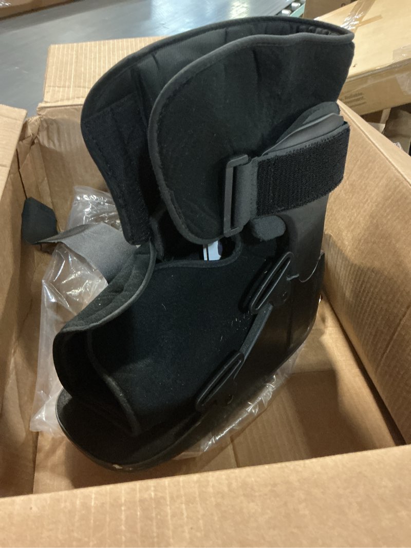 Condition photo showing As Is for united ortho short air cam walker fracture boot, large, black black large boot