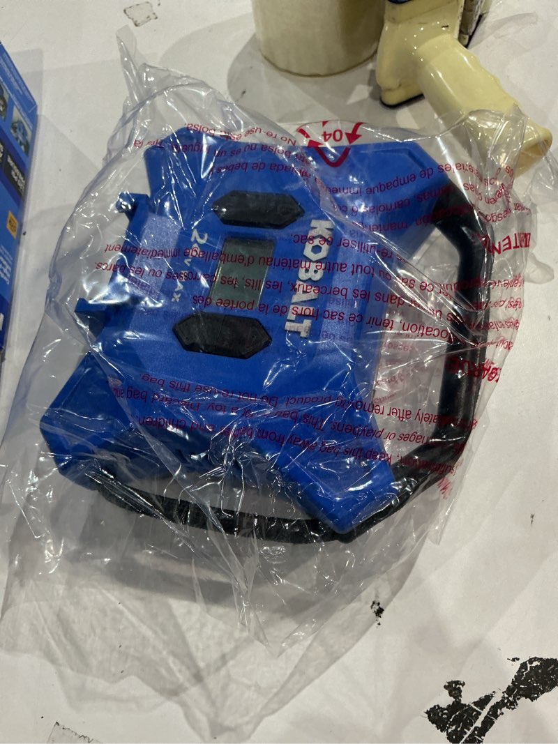 Condition photo showing As Is for item similar// cordless high pressure  li-ion air inflator (power source: battery)