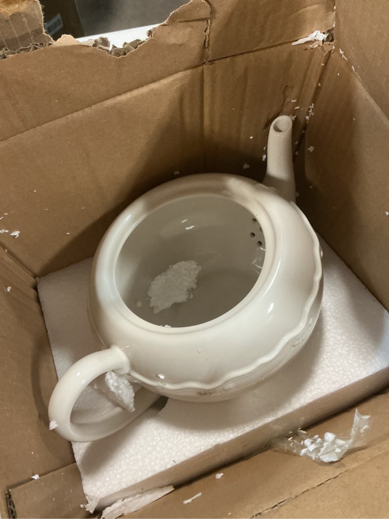 Condition photo showing Good Condition for heritage 48oz stoneware teapot with lid – elegant 10.75" x 7" x 7.25" ivory teapot featuring embossed scrollwork & vintage-inspired detailing – farmhouse serveware