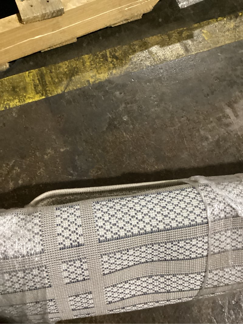 Condition photo showing Good Condition for woven gray border outdoor rug