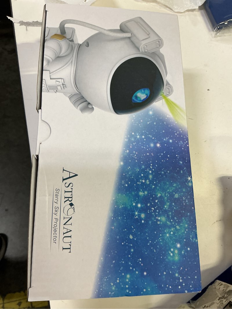 Condition photo showing New/Like New for star projector galaxy night light - astronaut starry nebula ceiling led lamp with timer and remote  gift for kids adults for bedroom  christmas  birthdays  valentine s day