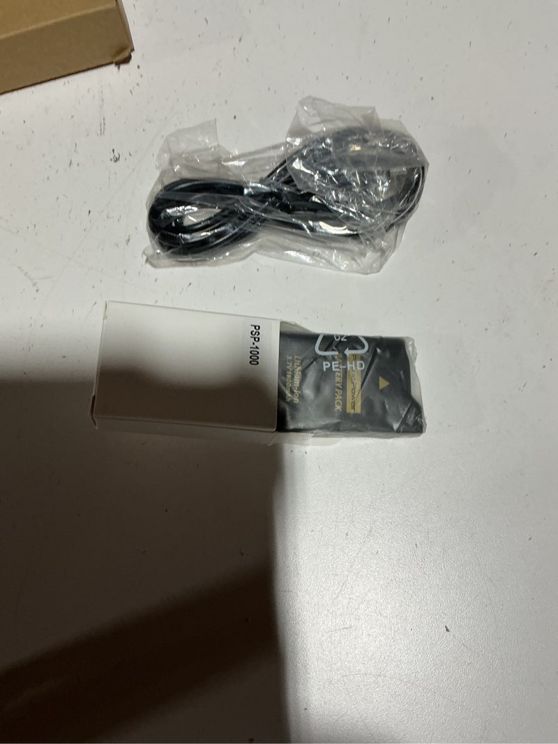 Condition photo showing New/Like New for Pickle Power 1800mAh PSP Battery and Charger Cable for Sony PSP-1000 PSP-110 (1001, 1002, 1003, 1004, 1005, 1006, 1007, 1008, 1010), PSP Fat Console 1 x Battery