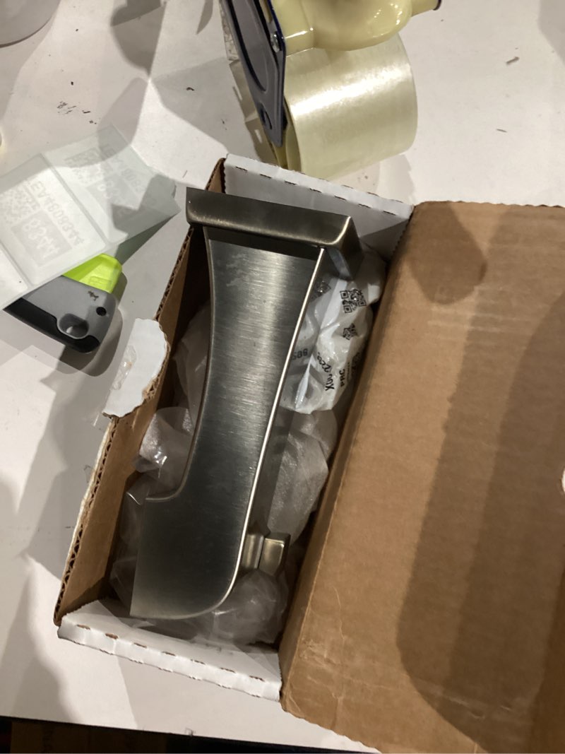 Condition photo showing As Is for delta faucet rp77092ss ashlyn, tub spout, stainless