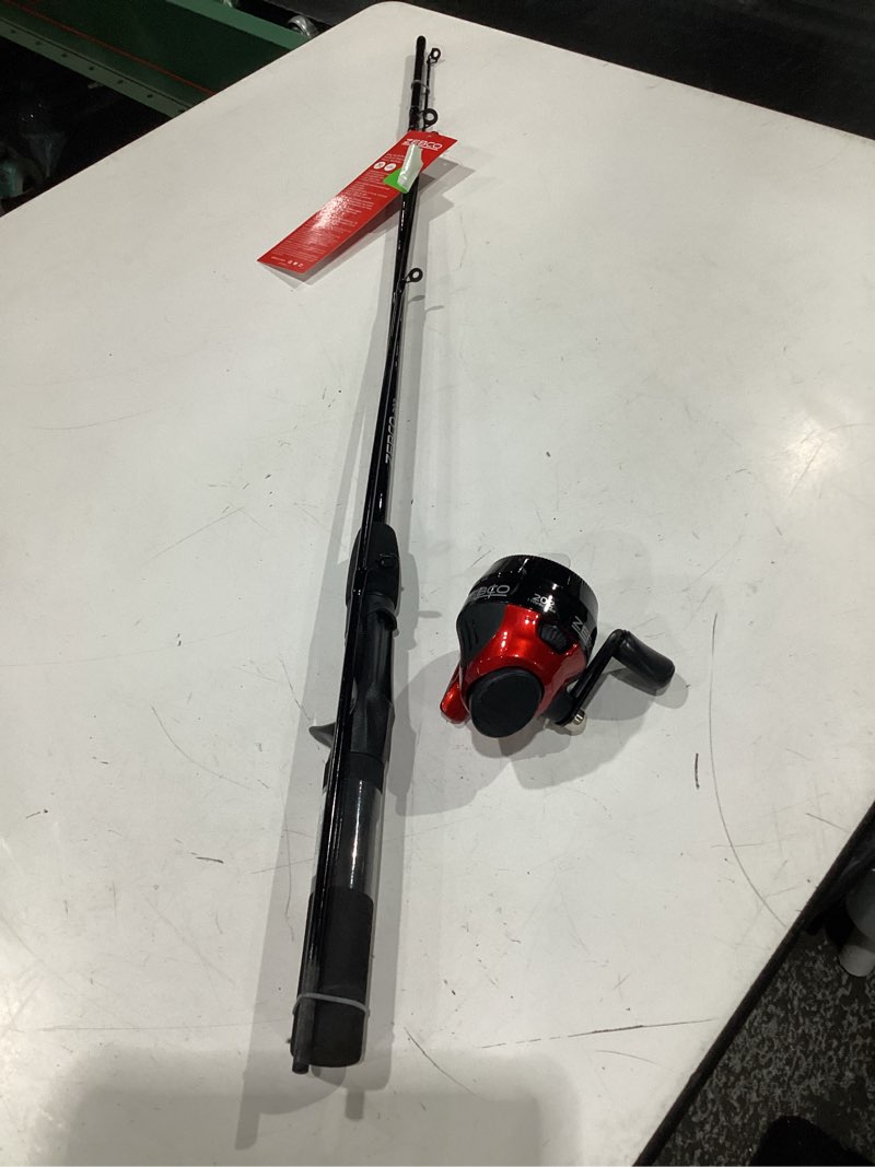 Condition photo showing As Is for zebco 202 spincast reel and fishing rod combo, right-hand retrieve, pre-spooled with 10-pound line, 5'6" rod - size 30 reel