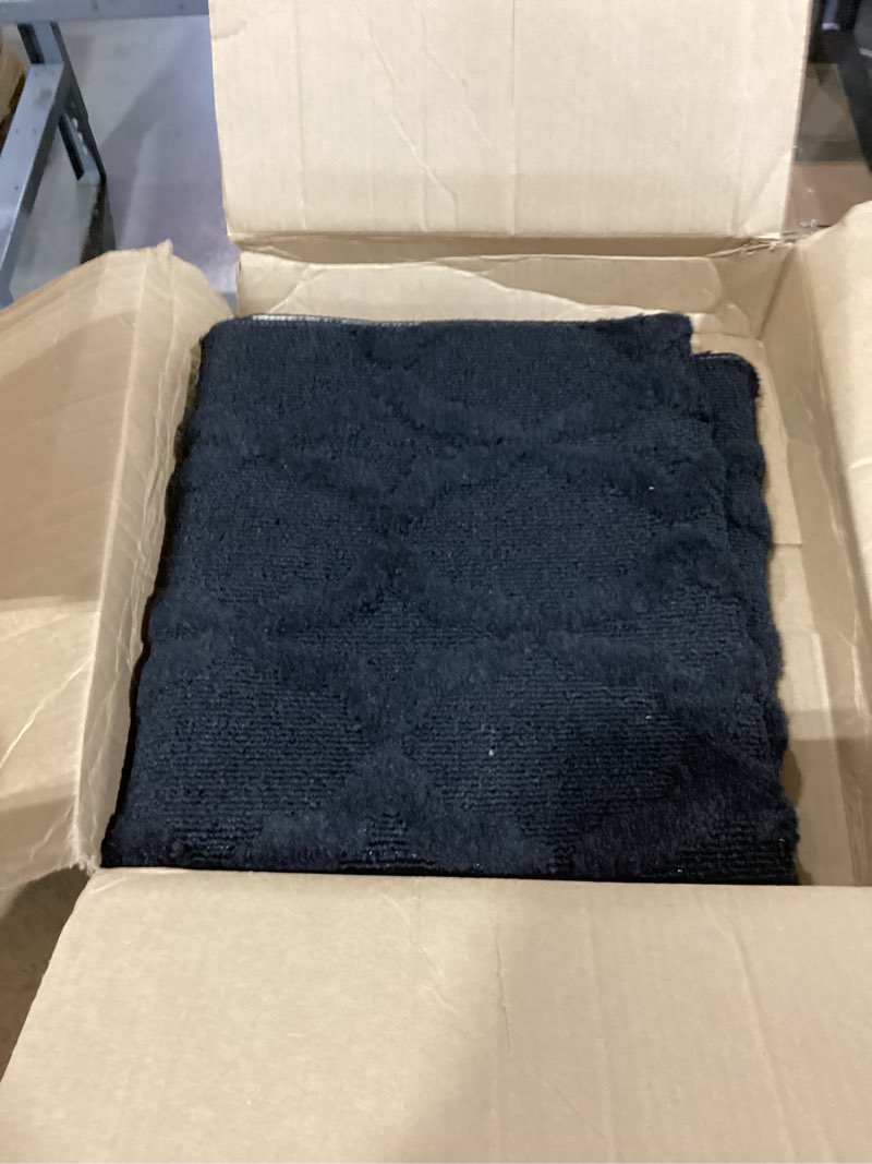 Condition photo showing Good Condition for garland rug sparta non slip polypropylene 3 ft. x 5 ft. black area rug- ideal for living rooms & hallways, stylish & durable for high traffic areas black 3' x 5' (rectangular)